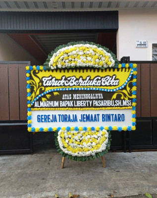 Papan Bunga Duka di Kolawa